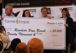 brett favre presents check to rawhide