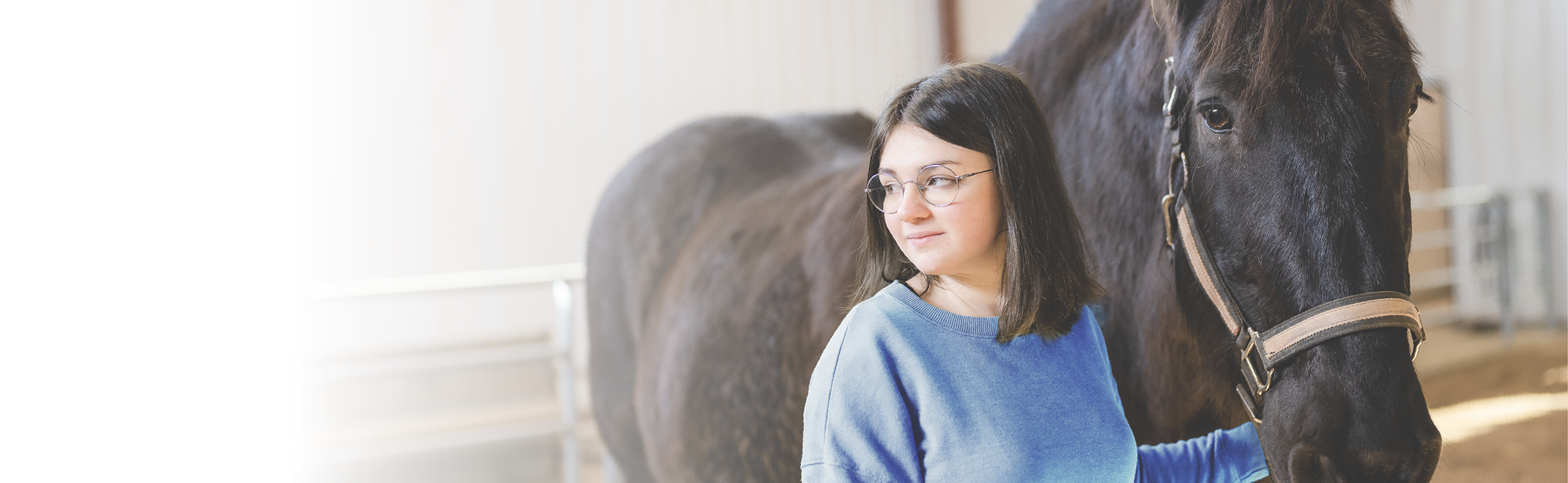 teen girl working with equine therapy horse